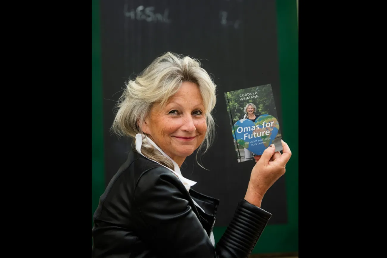 Hauptbild der Veranstaltung „EINE ANDERE, GLÜCKLICHE WELT IST MÖGLICH!“ - Buchvorstellung mit Cordula Weimann