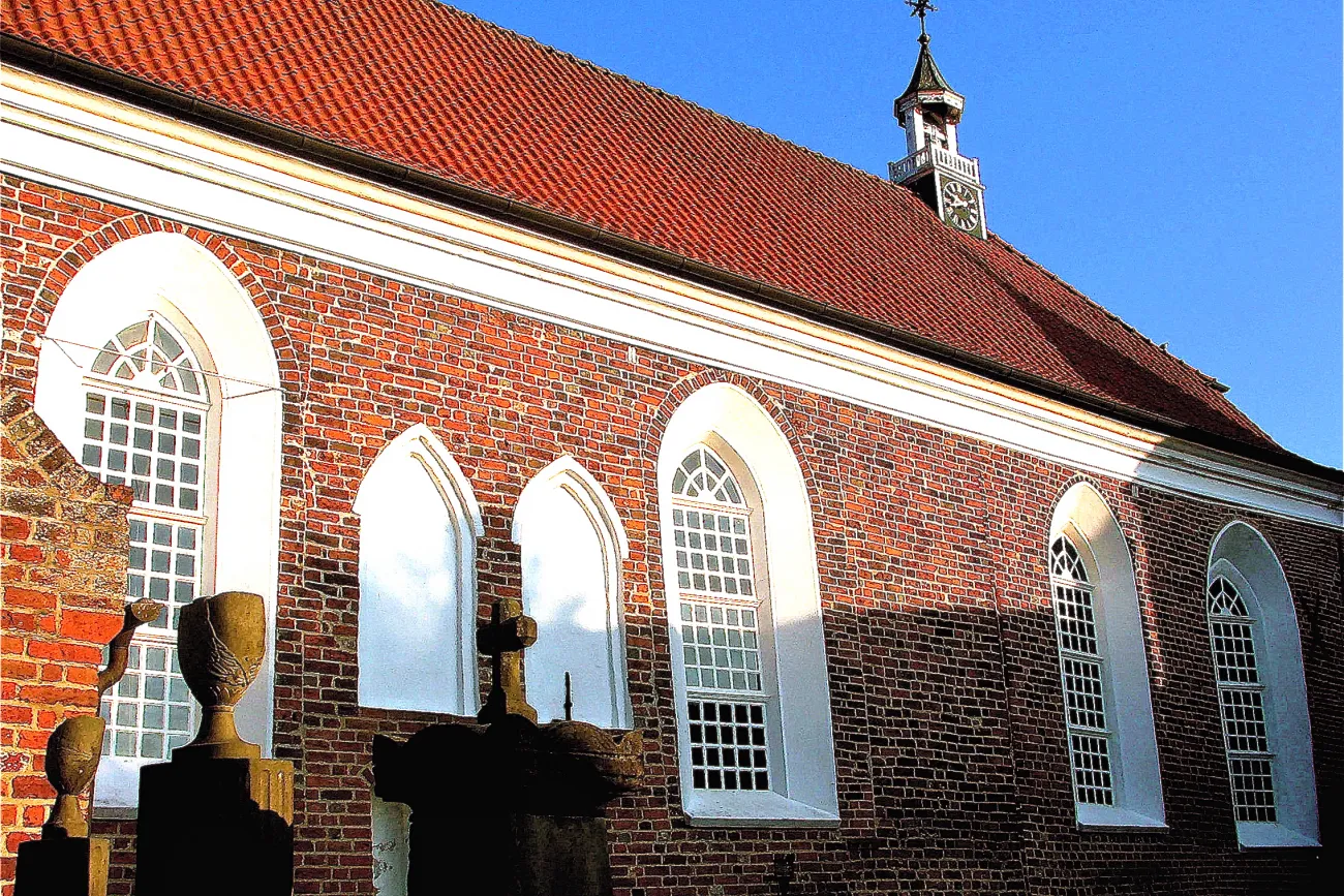 Greetsiel church from the outside, blue sky,